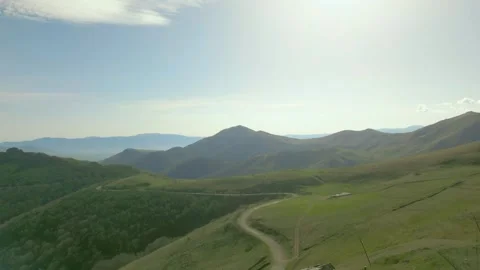 High mountains covered with grass and forest in sunny weather. Pushkin Pass. Video stock 254434359