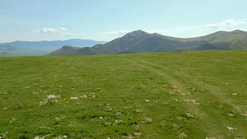 High mountains covered with grass and forest in sunny weather. Pushkin Pass. Stock Footage 254450761