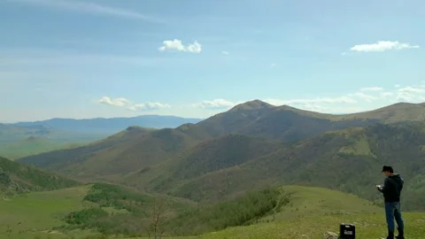 High mountains covered with grass and forest in sunny weather. Pushkin Pass. Video stock 254451873