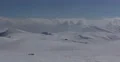 High Mountains Under Snow Winter Scenic Panorama White Background Wilderness Day 4k or 4k+ Resolution