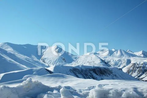 High mountains under snow in the winter Stock Photos