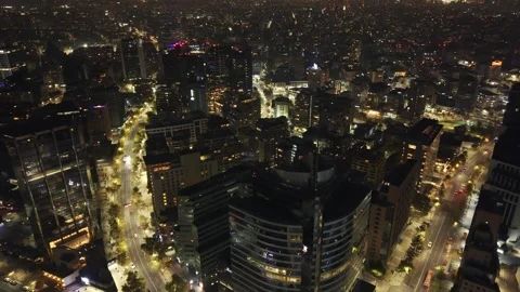 High night drone sweep over Apoquindo city grid Santiago Chile Vídeos de archivo 334637439