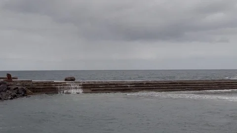 High ocean waves hitting rocks in Bajamar, Tenerife, Spain Video stock 122664410