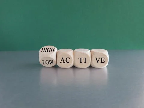 High or low active symbol. Turned a dice and changes the word High to low Stock Photos