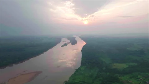 High overall drone view of sun reflecting in river forests on both banks, Congo Stock Footage 332000264