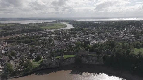High Pan Drone Shot over Chepstow Castle Distant Background View in 4K Видео 334656355