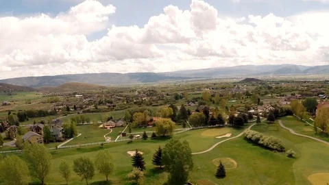 High pan right to left looking at villas Stock-Footage 105606542