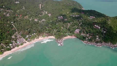 High panoramic tilt drone shot of an island, Koh Phangan, daytime and blue water Stock Footage 279165385