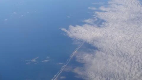 High panoramic view from an airplane. With clouds. Foto stock