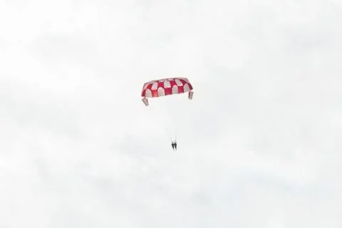High parasailing in the sky with clouds Stock Photos