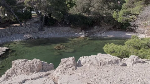 High path view of Lokrum Island Dead Sea beach, Dubrovnik, Croatia Stock Footage 294851699