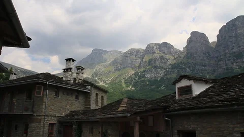 High Peaks Mountains Backround of Vilage Video stock 128312260