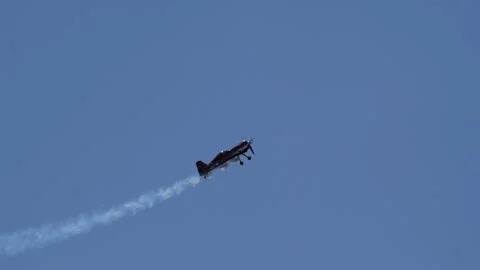 High Performance Aircraft Sukhoi Su-26 Vertical Pull Up Clear Sky Slow Motion Stock Footage 333492595
