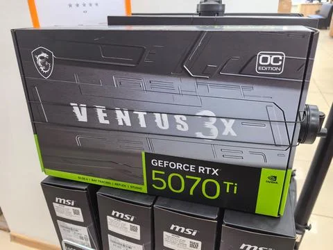 High-performance graphics card on display in a tech retail store Stock Photos