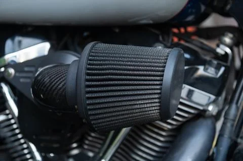 High performance motorcycle air filter cone on engine Фото