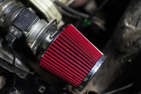 High performance red air filter of sport car with engine on back Stock Photos
