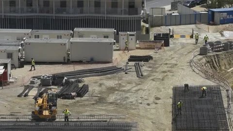 High perspective timelapse of a busy construction site Stock Footage 246312515