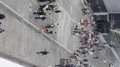 High perspective view of people dressed in traditional Bahia clothes and playing Stock Footage 259324739
