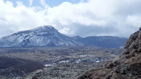 High Point Covered In Dark Tempest Clouds. Snowy Mountain Top Hidden Behind Stock Footage 328047013