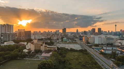 High POV With Wide Angle Lens Of Kuala Lumpur Cityscape During Sunset. Pan Ri Video stock 106656053