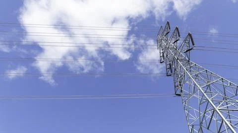 High power electrical pole on a cloudy sky. Stock Photos