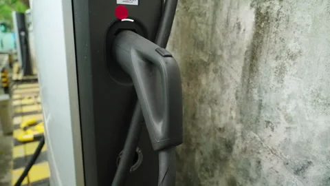 High power fast charging cable connected to BYD charging station in Shenzhen 動画素材 328385315