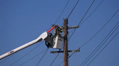 High power line and workers Stock Footage 50379792