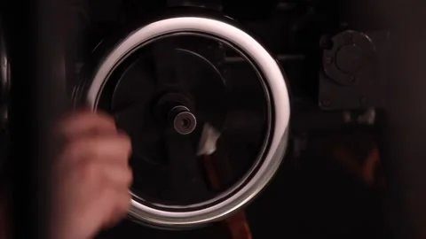 High-precision adjustment mechanism, an adjustment wheel, is operated. Video stock 237724556