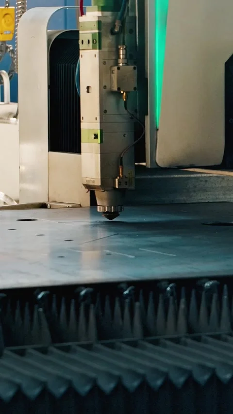 High Precision CNC Laser Cutter Processing Steel Sheet With Sparks In Factory Stock Footage 323711218