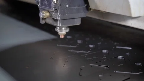 High precision CNC laser cutting metal sheet. Modern technologies allow to Stock Footage 71081579