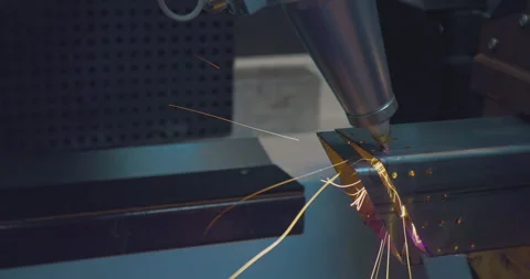 A high precision CNC laser machine produces a complex metal part. close-up. Stock Footage 243854357