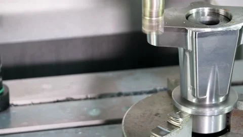 High precision CNC lathe. Close up, Seamless loop. CNC adopts table movement  Stock Footage 221637253