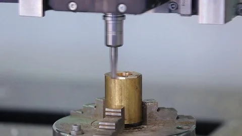 High precision CNC machining center 5 axis working, operator machining automotiv Stock Footage 73637163