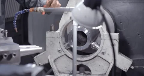 High-precision CNC machining center works, the operator of the automotive sample Stock Footage 167787023