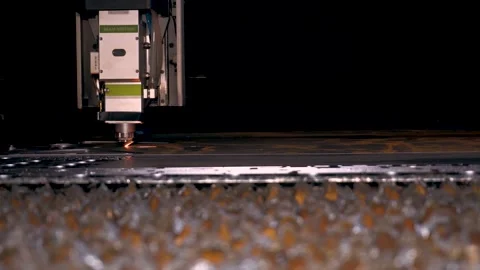 High precision cutting machine metal part. Modern machine laser metal sheet cnc Stock Footage 257354130