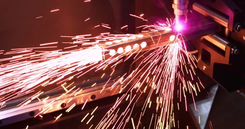 High-precision machine processing a metal part with a laser beam Stock Footage 334790032
