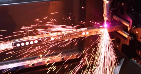 High-precision machine processing a metal part with a laser beam Stock Footage 334790673