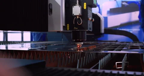 High-precision machine processing a metal part with a laser beam Stock Footage 334791508