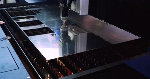 High-precision machine processing a metal part with a laser beam Stock Footage 334792400