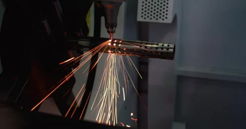 High-precision machine processing a metal part with a laser beam Stock Footage 334793354