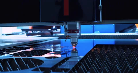 High-precision machine processing a metal part with a laser beam Stock Footage 334796207
