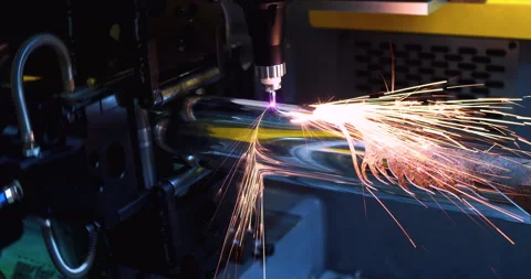 High-precision machine processing a metal part with a laser beam Stock Footage 334801107