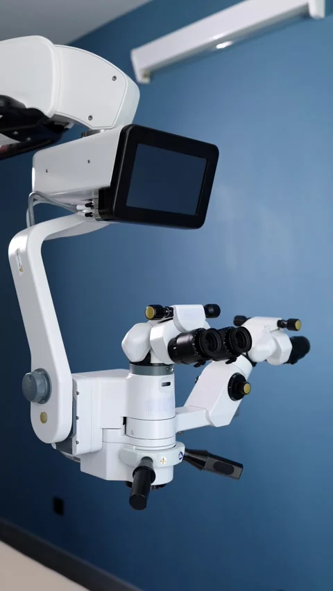 High-precision medical microscope with adjustable components and display screen Stock Footage 337386169