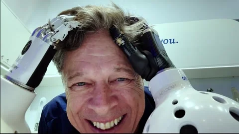A high-precision robotic hand is a bionic technology in the digital world. 스톡 동영상 334804377