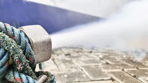 High Pressure Liquid CO2 Release from Flexible Hose Stock Footage 332481361