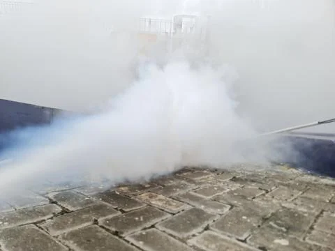High Pressure Liquid CO2 Release from Tank Dense Industrial Gas Vapor Cloud Stock Photos