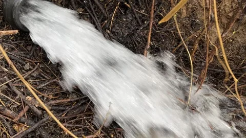 High-Pressure Water Flow from Pipe for Field Irrigation Видео 321629992
