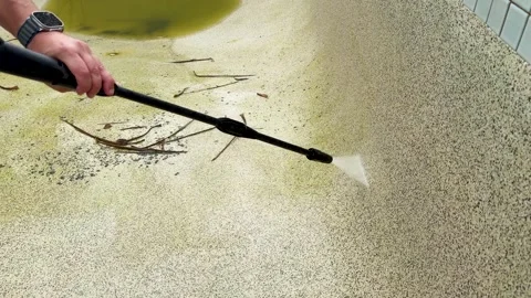 High Pressure Water Jet Cleaning Algae From Concrete Swimming Pool Stock Footage 337691008