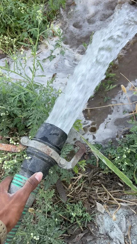 High Pressure Water Pipe Irrigation in Agriculture Field Stock Footage 332002089
