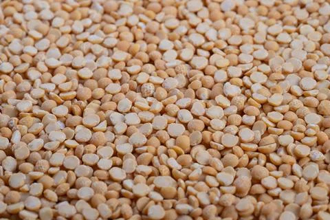 High protein yellow split peas, nutrient rich closeup conveying healthy diet cho Stock Photos